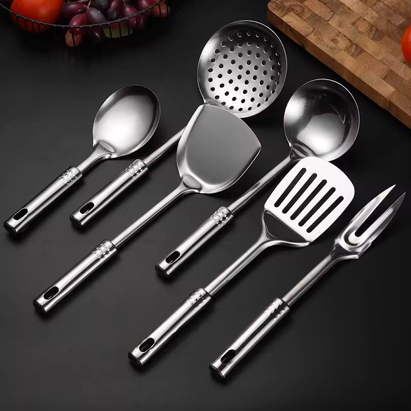 7-Piece Stainless Steel Kitchen Utensil Set with Rotating Stand